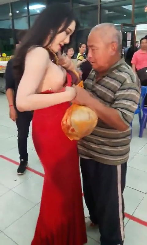 Old Man Pressing Model Boobs Openly