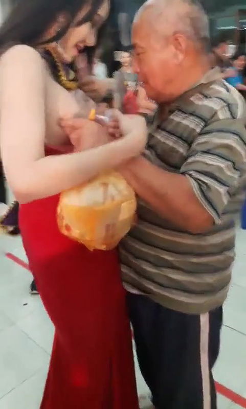 Old Man Pressing Model Boobs Openly