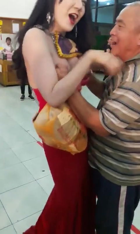 Old Man Pressing Model Boobs Openly