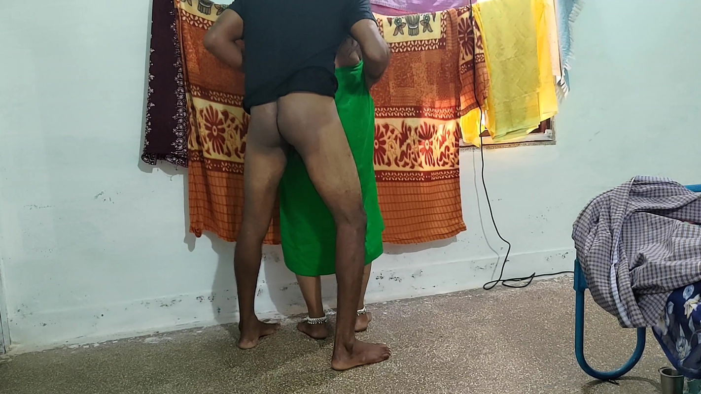 Aunty was tying the skirt and fixing the cloth and I stroked her and made her romantic