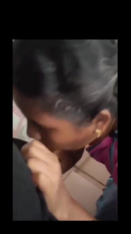 Desi Village aunty showing boobs nd sucking in bathroom