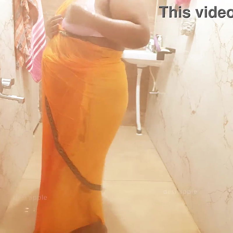 Indian maid bathing in saree