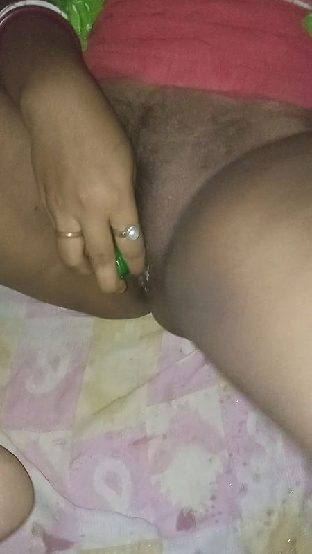 Desi bengali boudi or bhabhi oil bottal fuck. She is squirting many time