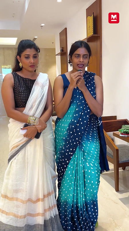 Divya prabha and Kani kusruti in sleeveless blouse giving reply to reporters