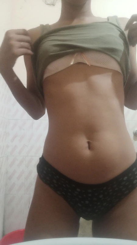 Indian girl in bathroom showing boobs and pussy.