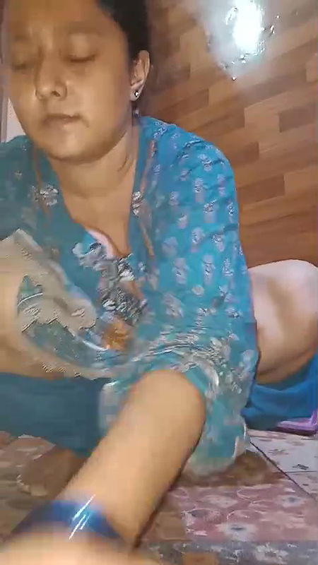 Horny bhabhi taking tool inside pussy