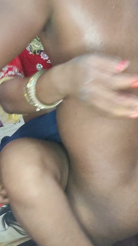 Left sister-in-law of Indian village in Lal Saari, left aunty of Indian village in Lal Sari