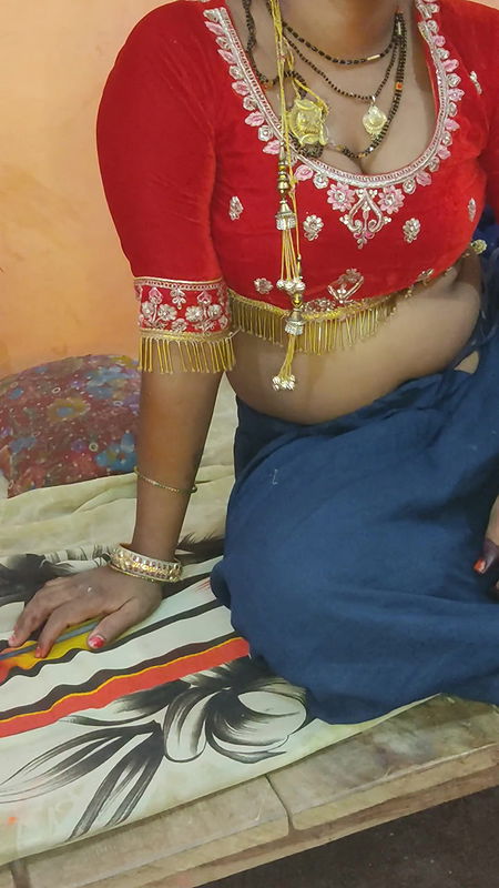 Left sister-in-law of Indian village in Lal Saari, left aunty of Indian village in Lal Sari