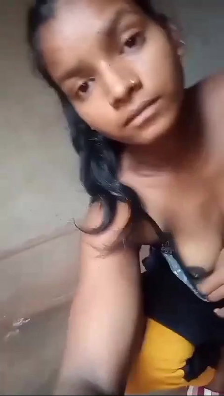 Young village girl spreading