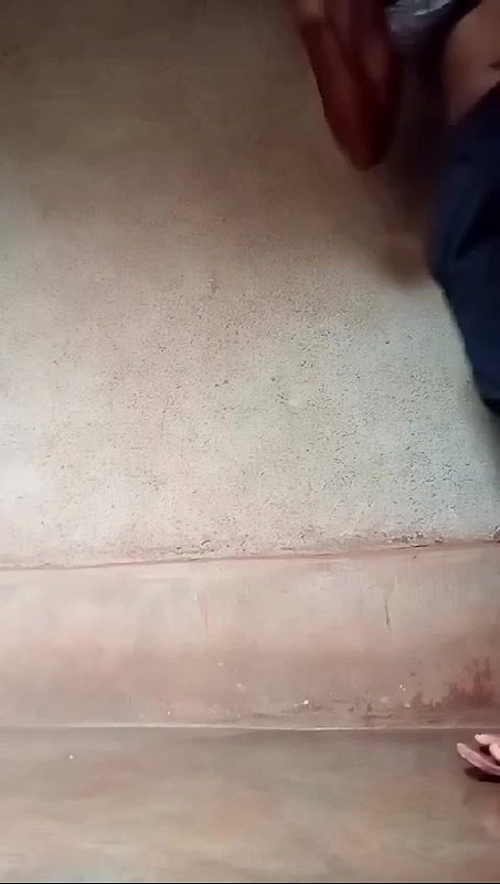 Young village girl spreading
