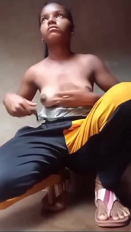 Young village girl spreading