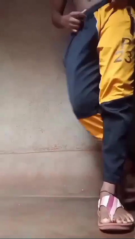 Young village girl spreading