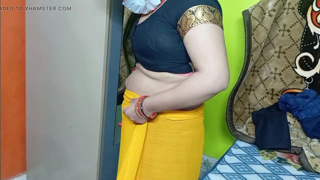 Beautiful bhabhi wearing yellow sari