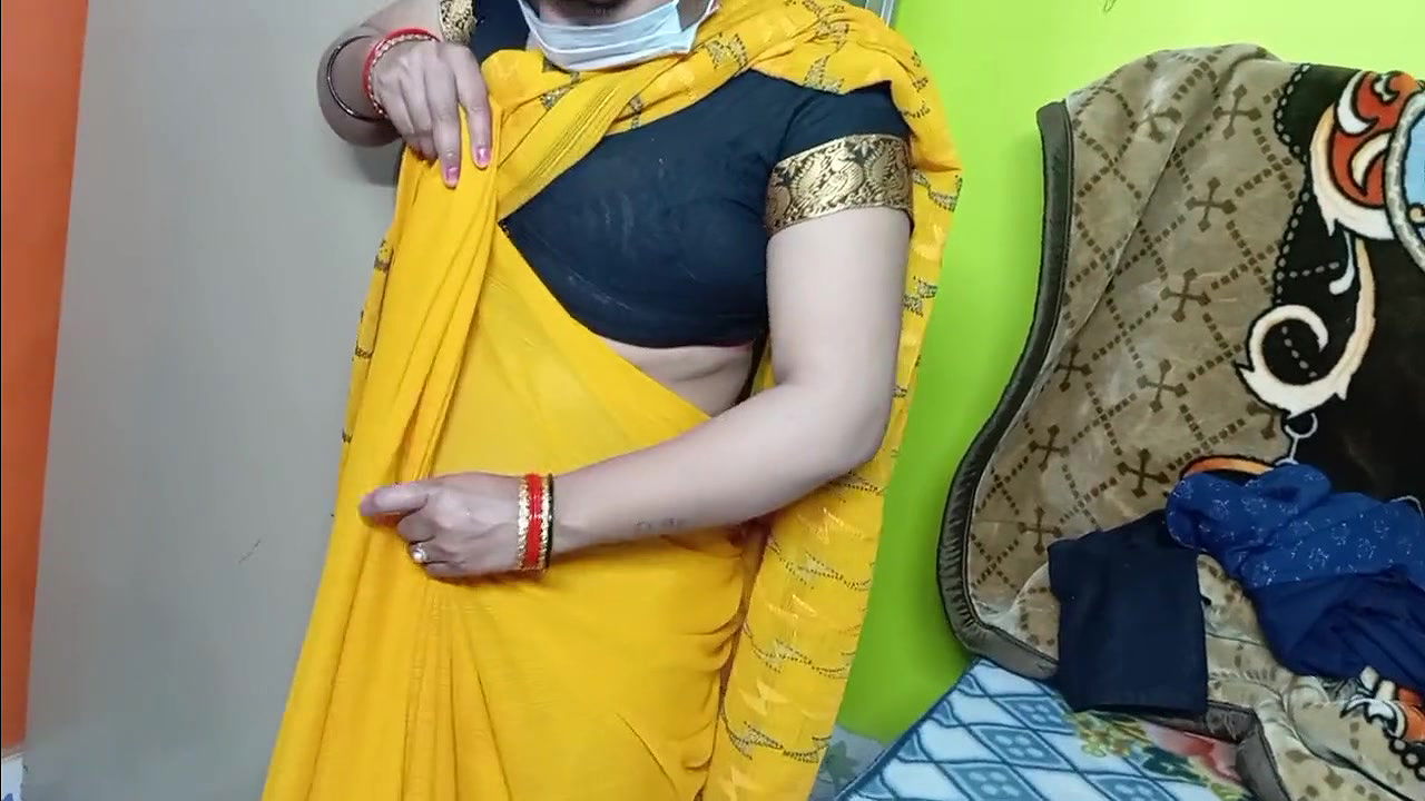 Beautiful bhabhi wearing yellow sari