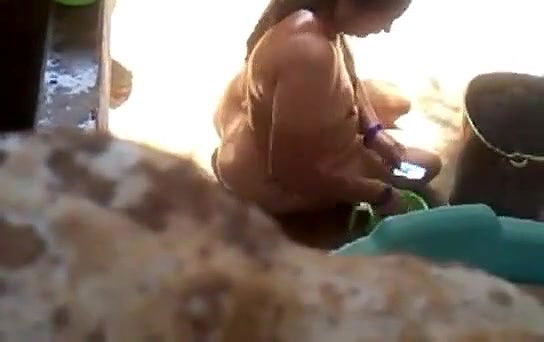 aunty bathing in open