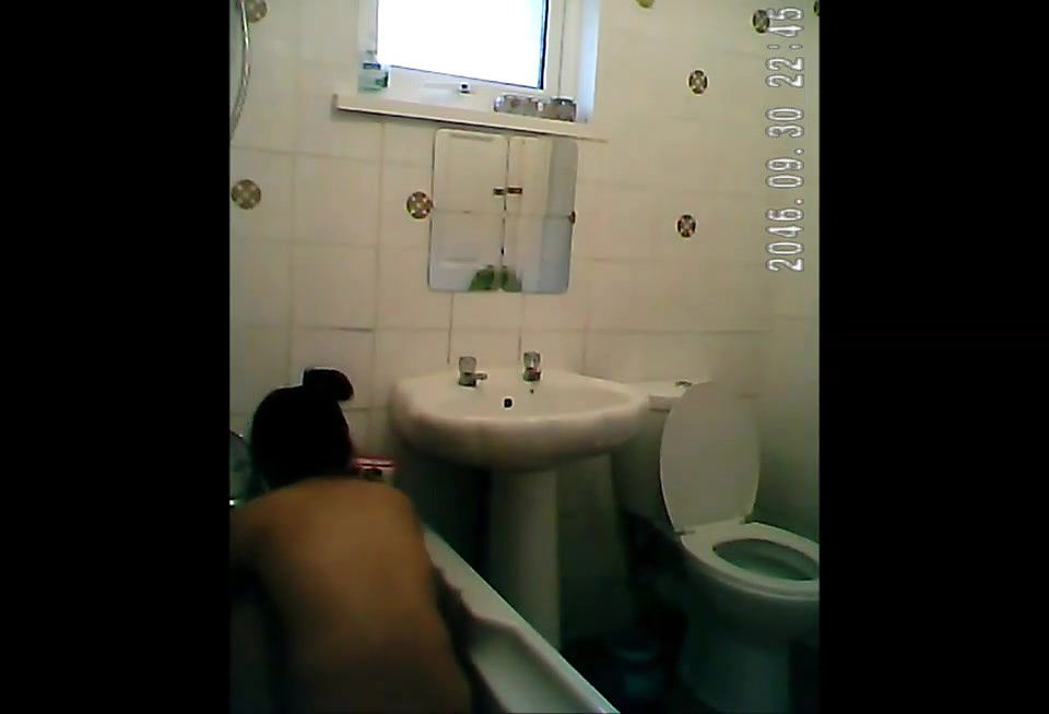 big boob babe cleaning bathroom andhower 1