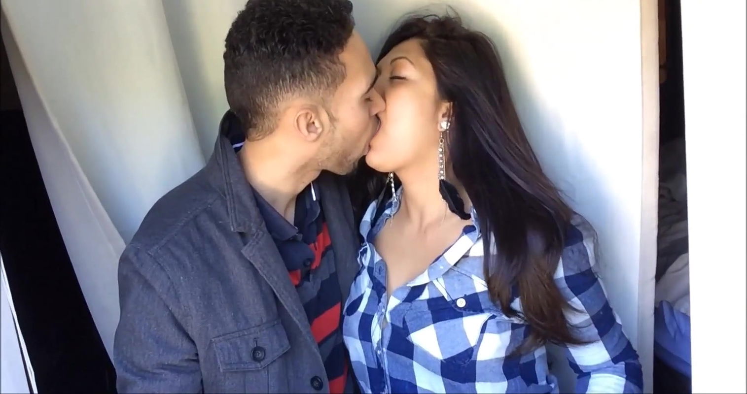 british indian couple passionate kissing