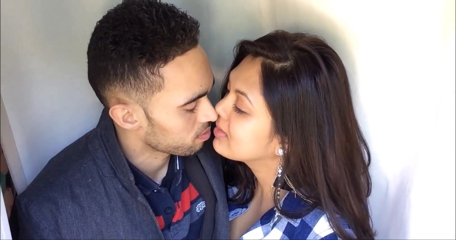 british indian couple passionate kissing