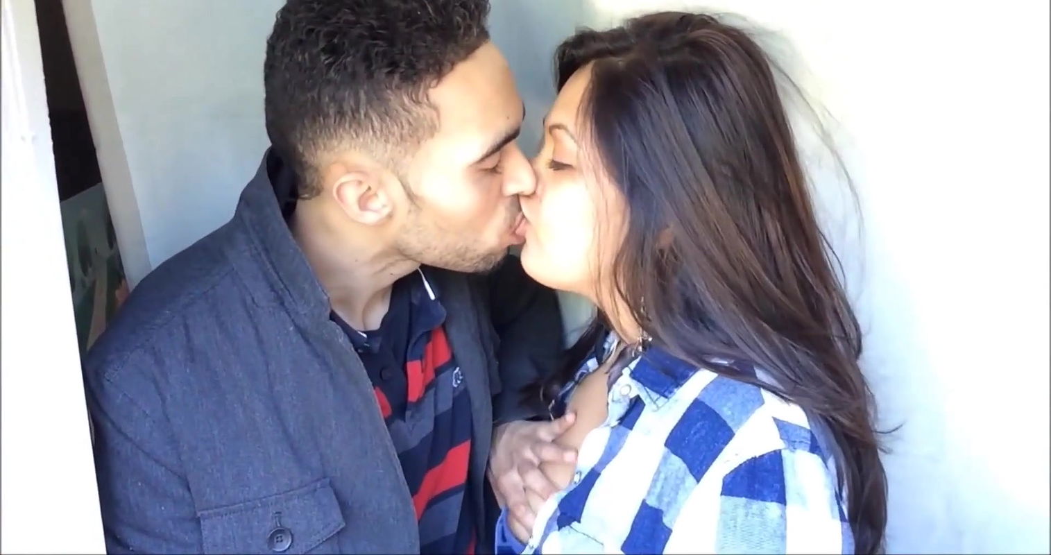 british indian couple passionate kissing