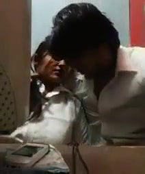 desi couple intimate moment in cafe