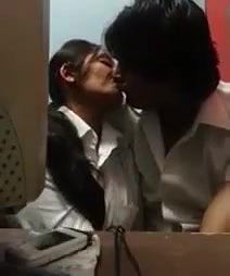 desi couple intimate moment in cafe