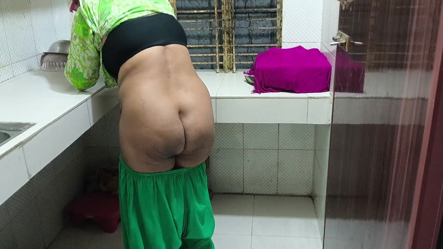 I suddenly see my aunty cleaning the dishes in the house