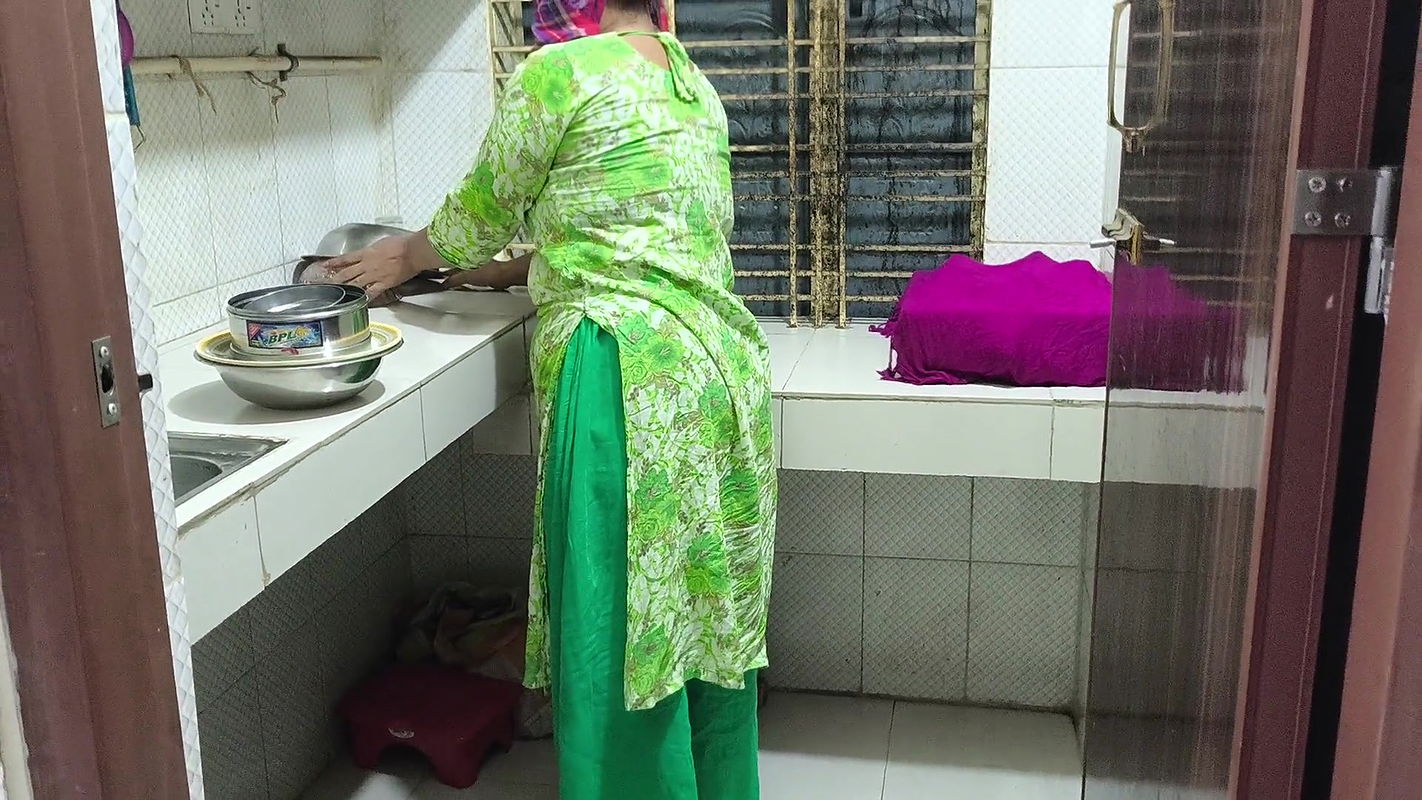 I suddenly see my aunty cleaning the dishes in the house