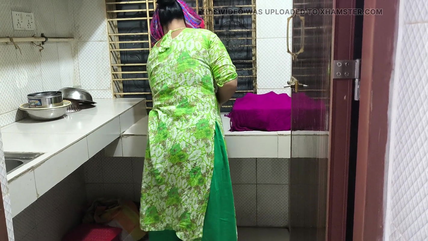 I suddenly see my aunty cleaning the dishes in the house