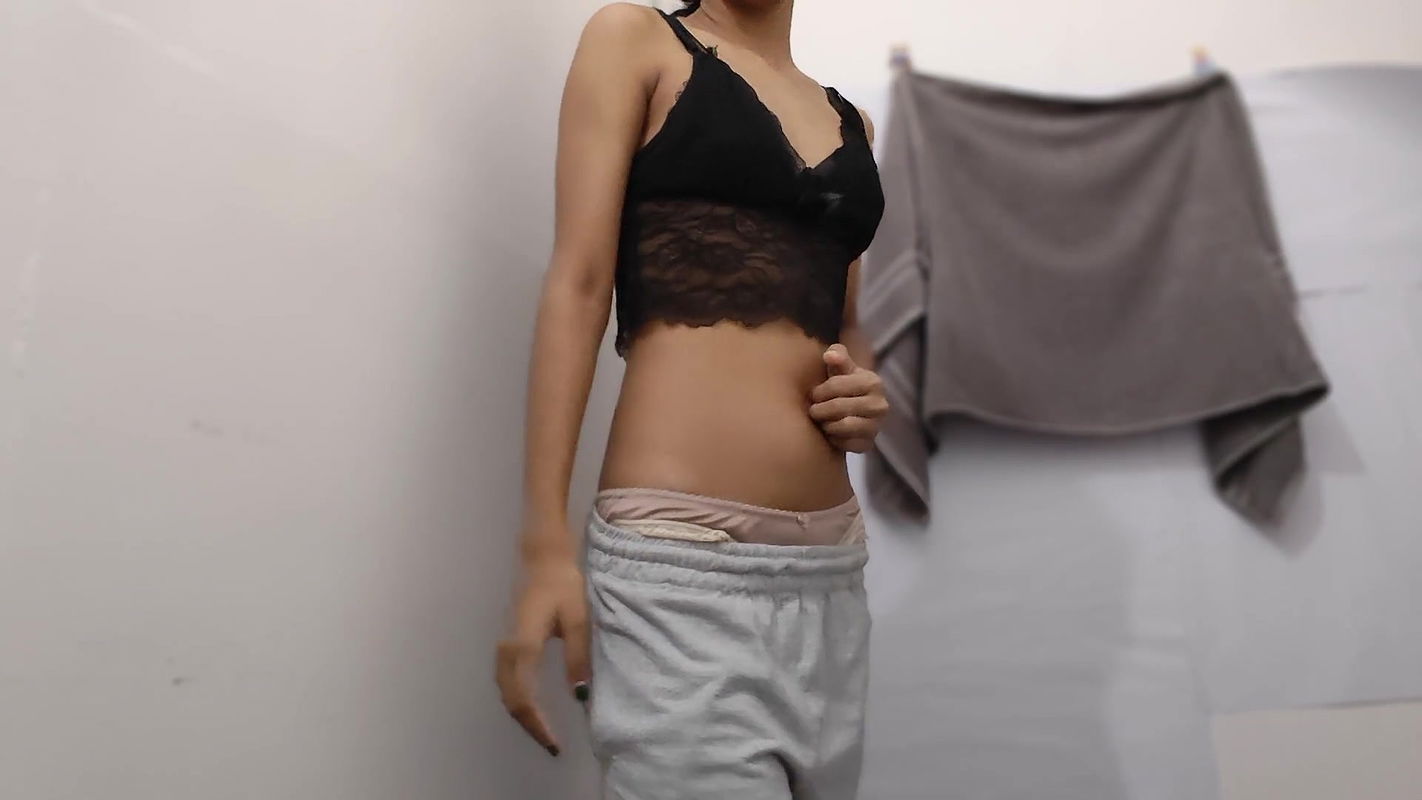 College girl with giant boobs strips and shows shaved pussy