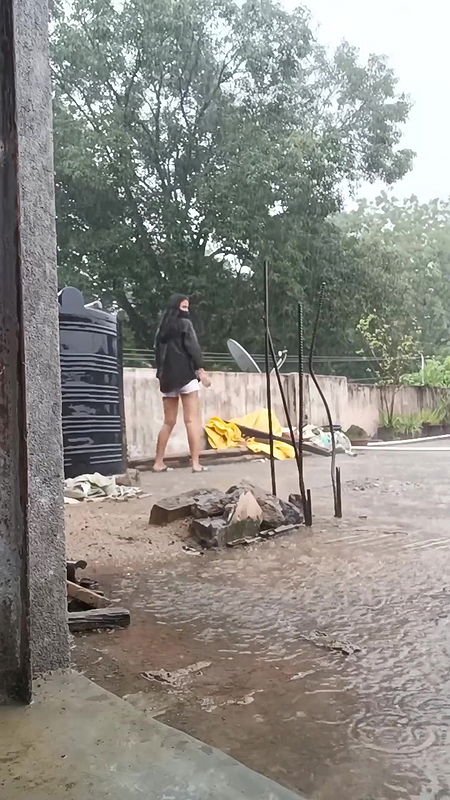 Cute desi college girl playing hard in rain boobies shake
