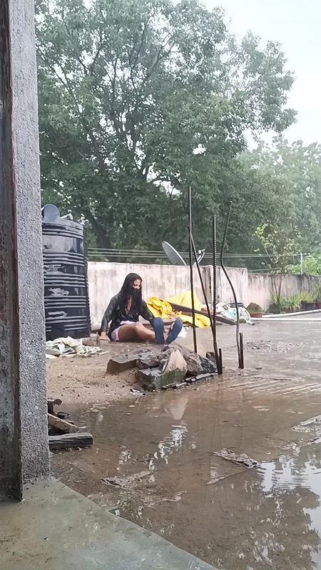 Cute desi college girl playing hard in rain boobies shake