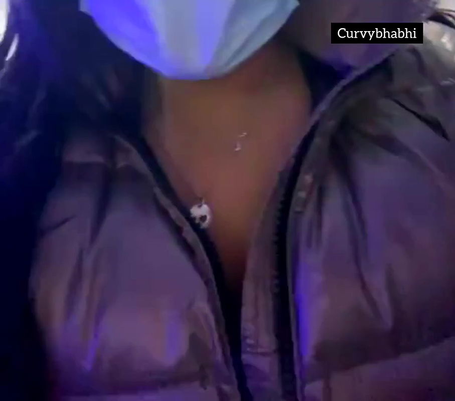 Desi bhabhi showing her boobs in her jacket in public place