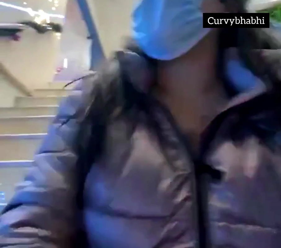 Desi bhabhi showing her boobs in her jacket in public place