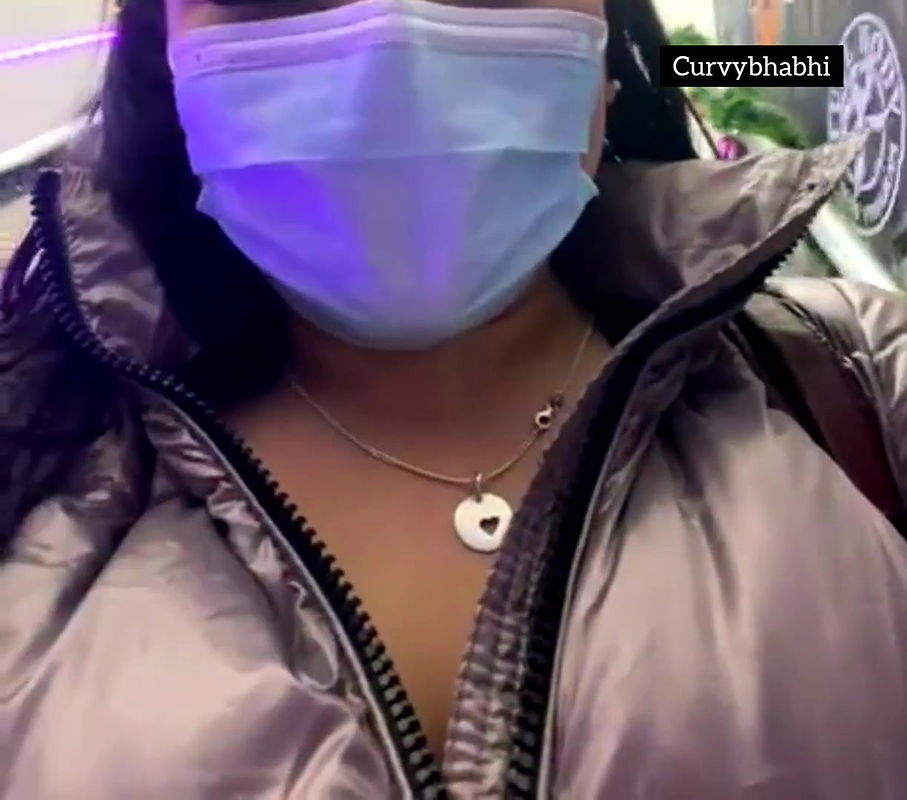 Desi bhabhi showing her boobs in her jacket in public place