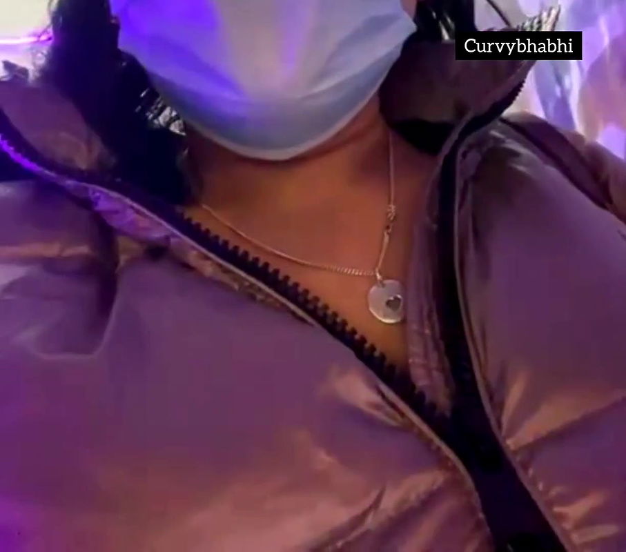 Desi bhabhi showing her boobs in her jacket in public place