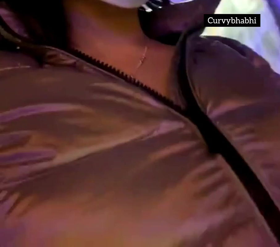 Desi bhabhi showing her boobs in her jacket in public place
