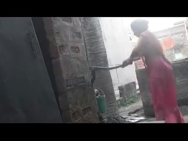 my maid takinghower at backyard