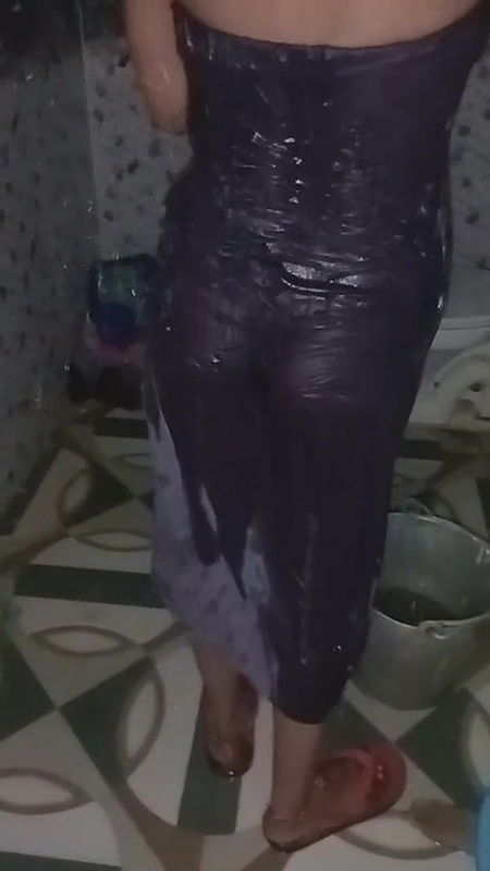 Desi village girl Priya Bhabhi bathing in bathroom while husband makes a video