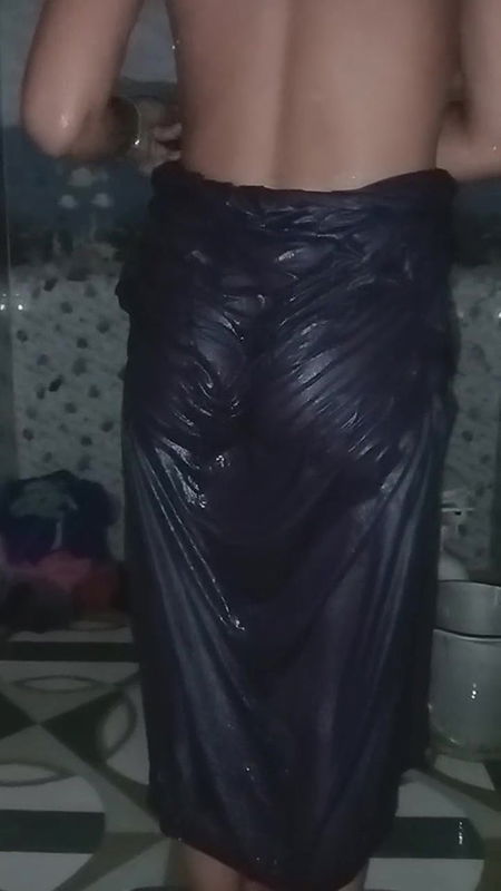 Desi village girl Priya Bhabhi bathing in bathroom while husband makes a video