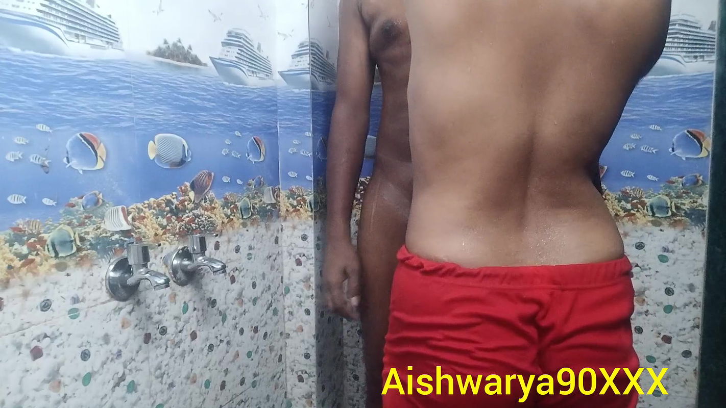 Indian wife bathing with her husband