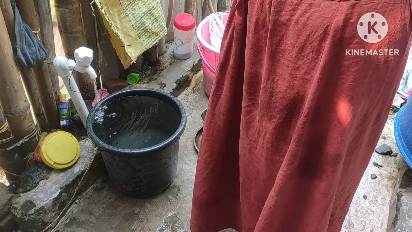 Indian Woman Washing Outside