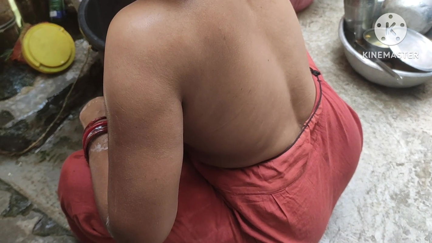 Indian Woman Washing Outside