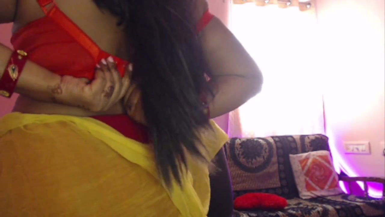 Desi sexy sensual Bhabhi removes her big boobs bra, presses her boobs and does self sex by fingering her pussy