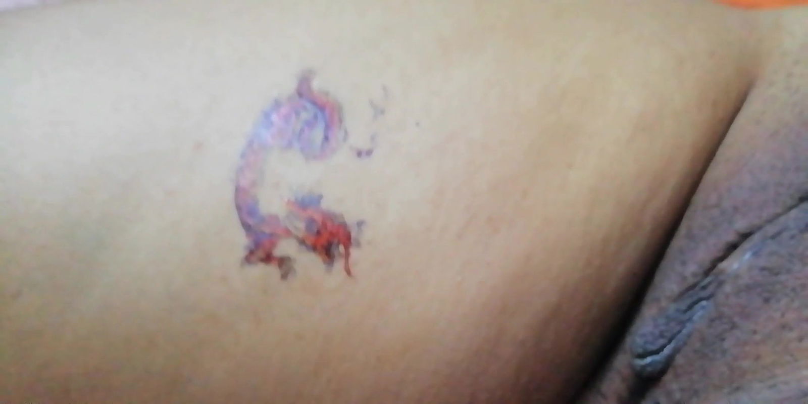 dragon tattoo on thigh near pussy