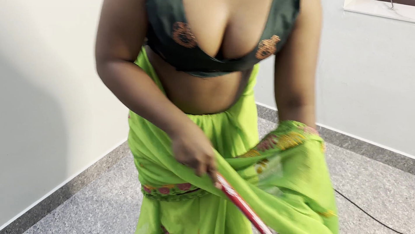 cute girl cleaning house and shows her boobs