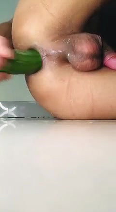 I fucked my ass with cucumber and later I cum in my cock