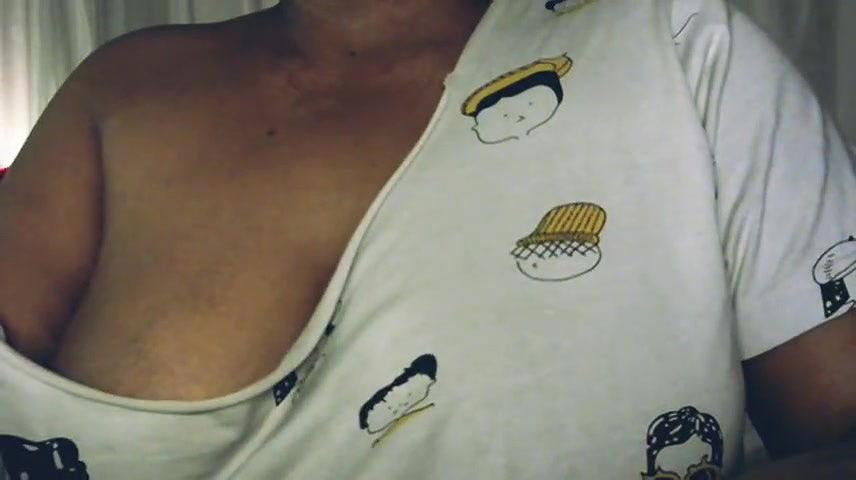 Hot sexy girl shows her big boobs by pressing them