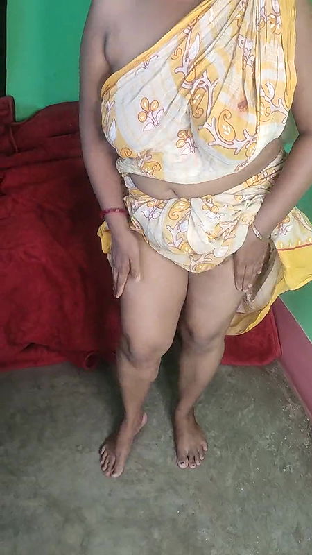 Indian horny Mommy pissing on the floor and squirting her pussy