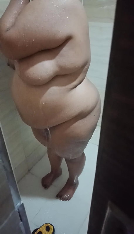 Indian wife taking shower and husband record
