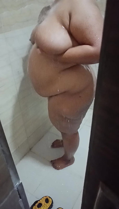 Indian wife taking shower and husband record